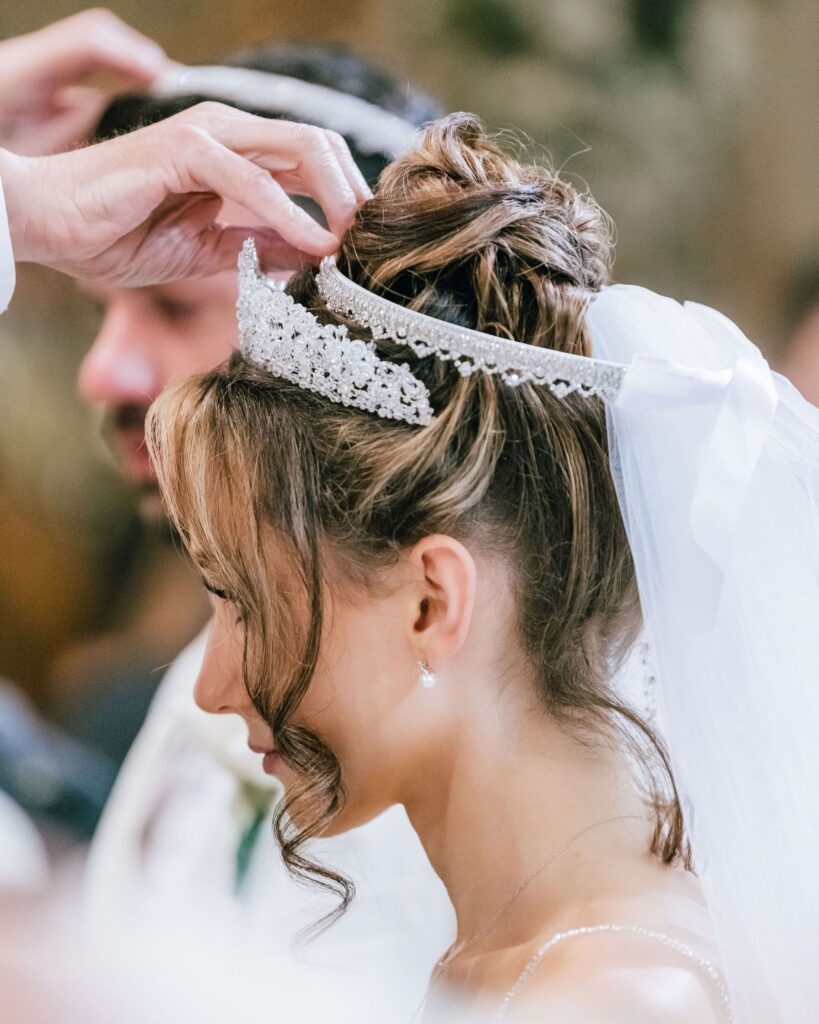 Stefana crowing on greek bride at Assumption church in Chicago